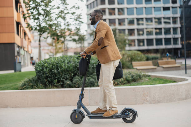 istock Man riding scooter, stylish and energetic outdoor 2205516579