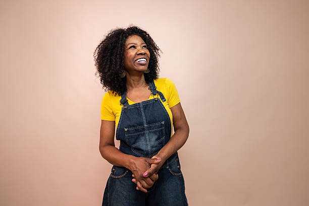 istock Mature woman contemplating in a studio shot 2205518896