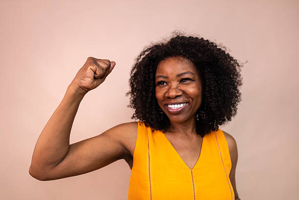 istock Confident mature woman in a studio shot 2205518902
