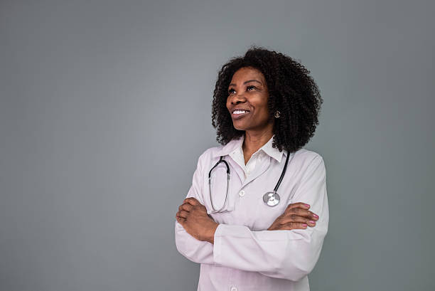 istock Female doctor contemplating in a studio shot 2205521715
