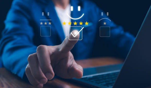 istock Hand using phone give five-star rating to service experience, Customer review satisfaction feedback survey concept. Customer review satisfaction feedback survey concept. 5 star score, Positive Review. 2205521734