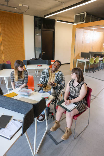 istock Disabled coworkers in modern office 2205523828