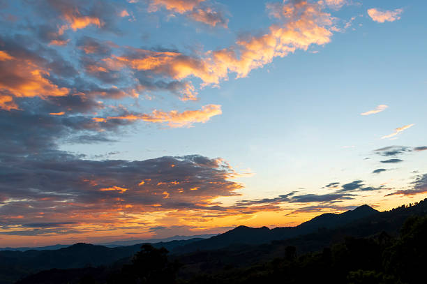 Golden sky sunrise dramatic beautiful landscape view. Dawn sky gold dusk time cloudscape with sunlight. Dramatic sunset scenic landscape. Beautiful landscape sunshine nature