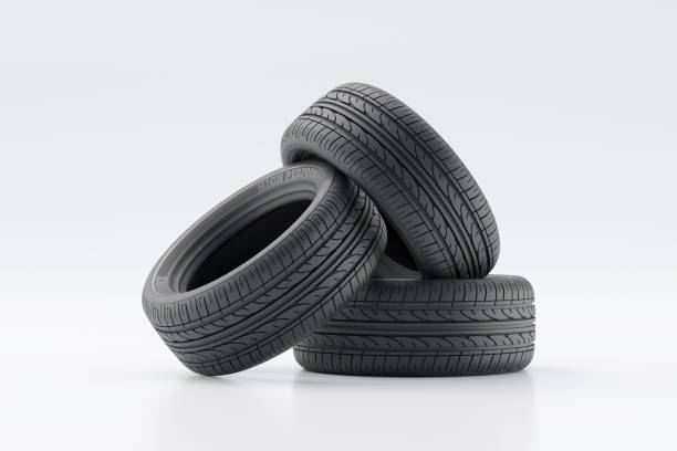 istock Three Modern Car Tires Stacked in a Minimalist Studio Setting 2205525135