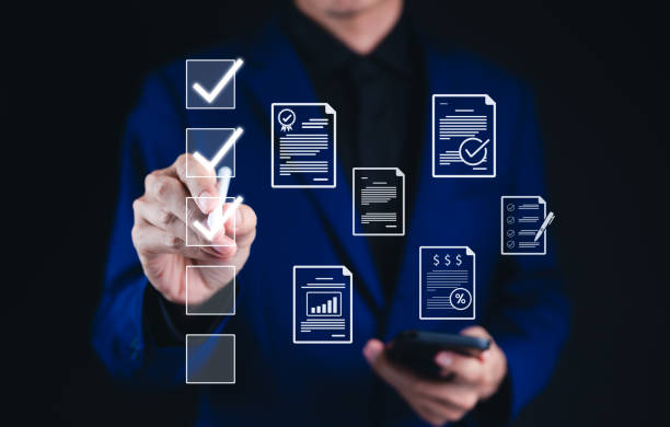 istock Online assessment and survey concept. Businessman interacts with virtual checklist, online assessments, surveys, exams, or quizzes. digital evaluation, data collection, Fill out form online test, 2205527412