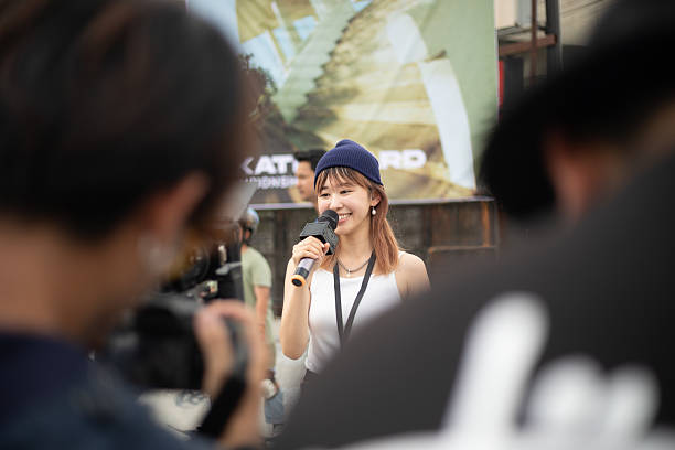 istock Woman Reporting From Skate Event 2205528417