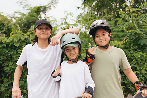 Young girls hanging out at the skatepark together