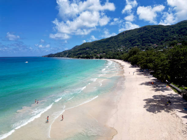 istock Anse Cocs beach, La Digue Seychelles, tropical beach during a luxury vacation in Seychelles. Tropical beach Anse Cocs beach, La Digue, Praslin, Mahe Seychelles with turqouse colored ocean 2205531071