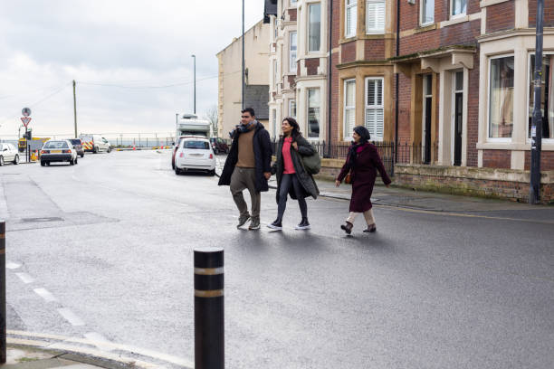istock Multigenerational Family Crossing a Road 2205535331