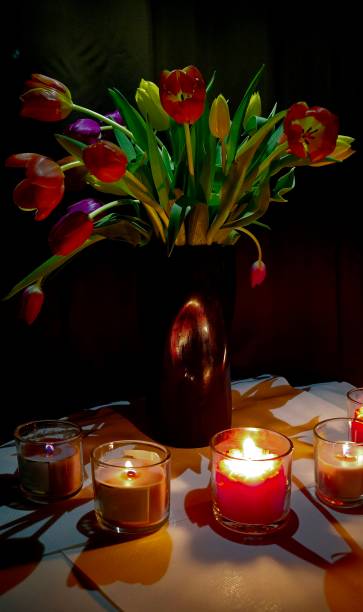 istock romance, flowers, and candles 2205535839