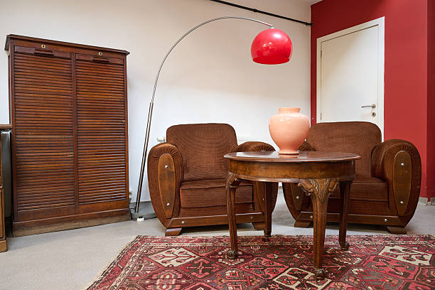Sofa in an old mansion with a red rose 