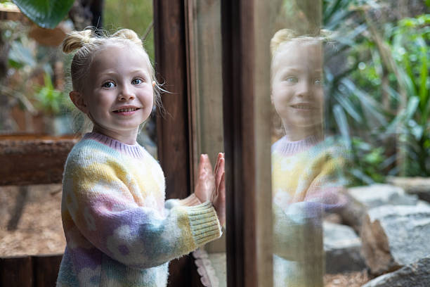 istock Curious Girl at the Zoo 2205538935