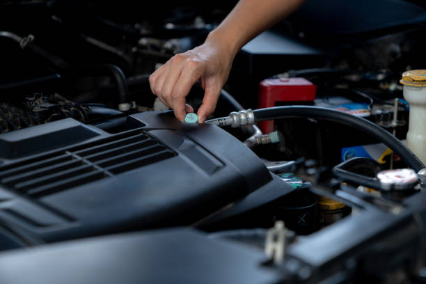 istock The young woman is inspecting the engine. 2205541787