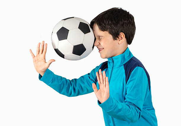 istock soccer ball hits the head 2205543031