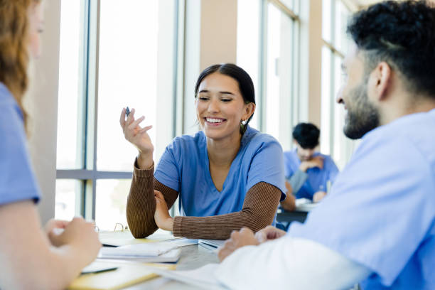 istock Medical Students Collaborating: Teamwork and Discussion in a Classroom 2205543563