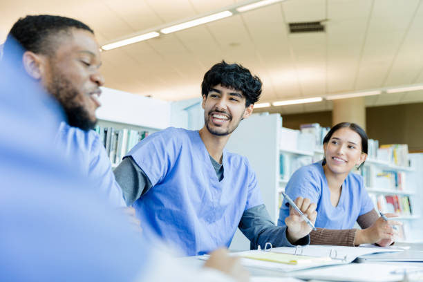istock Multiracial Medical Students Collaborate in Library 2205543801