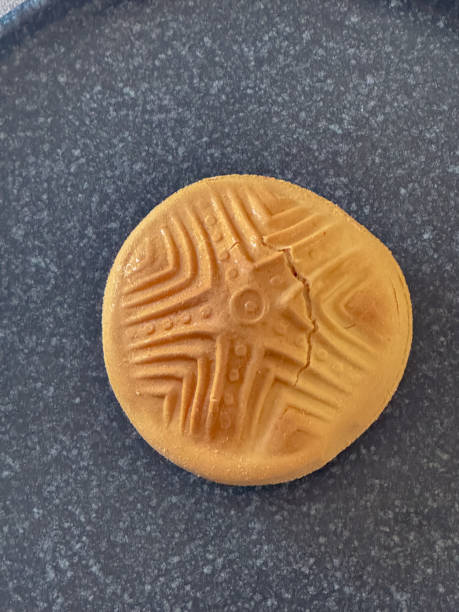 Traditional Sardinian bread with an ancient pintadera stamp design, symbolizing cultural heritage