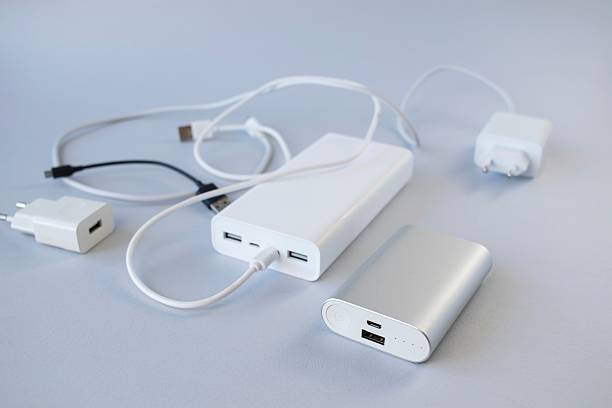 istock Power bank, external battery and USB cable, universal mobile battery for recharging gadgets 2205550305