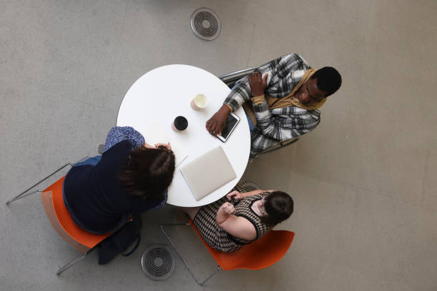 istock Disabled people sitting at table with laptop 2205557144