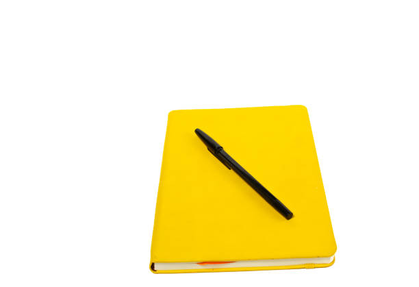 notebook and black pen isolated on white background.education concept