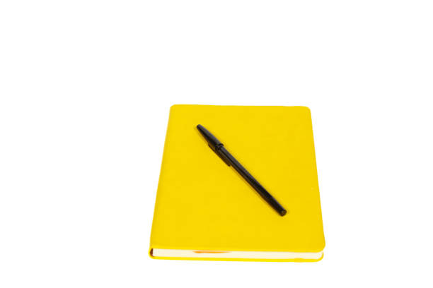 notebook and black pen isolated on white background.education concept