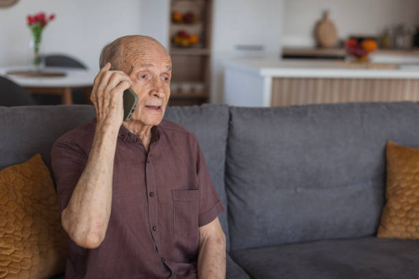 istock Senior man taking to phone 2205561933