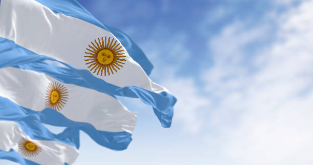 istock Argentina national flags waving on a clear day 2205562520