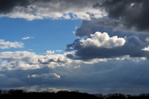 Beautiful blue sky and white fluffy cloud background