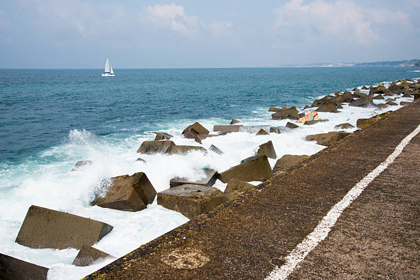 Dam near Saint Jean de Luz with colourful stone. France