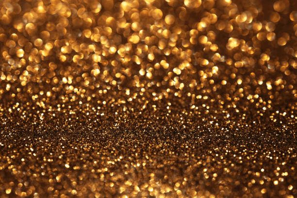 istock Golden glitter festive bokeh background 2205569403
