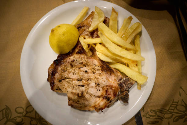 istock Pork steak with french fries 2205569480