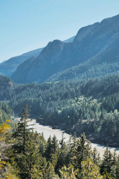 The Fraser River running through the Fraser Canyon during a summer season in Fraser Valley, British Columbia, Canada.