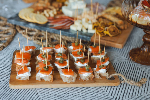plate of canapes with cheese cream and smoked salmon