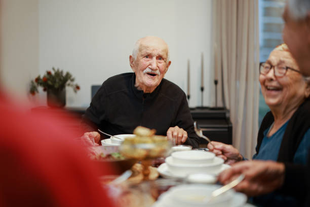 istock Senior Couple Enjoying Dinner Together 2205580695