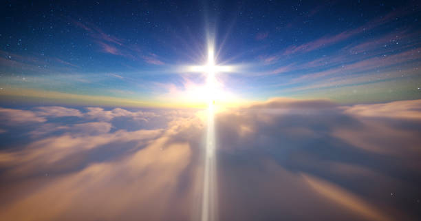 istock Luminous cross on blue starry sky and moving clouds 2205581312