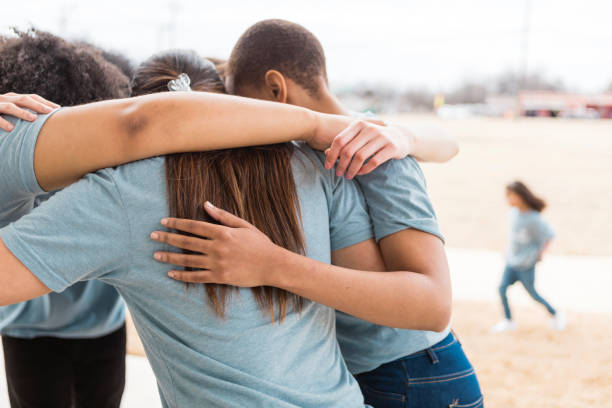 istock Women embracing, showing emotional support and togetherness 2205590347