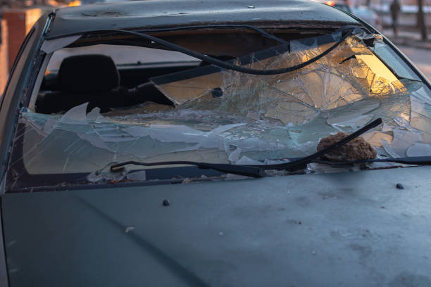 istock Abandoned and completely wrecked car. Close-up of the broken windshield 2205592839