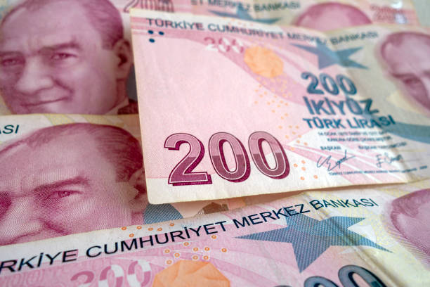 istock Background of Turkish Lira banknotes. 2205594589
