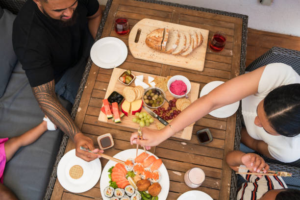 istock Family gathered around a healthy table. 2205594767