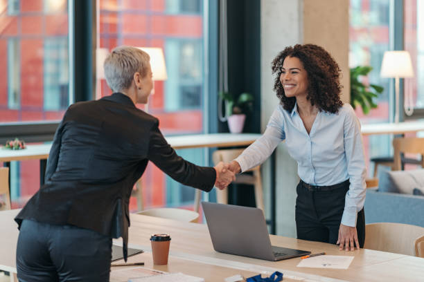 istock Shaking on a business deal 2205598773