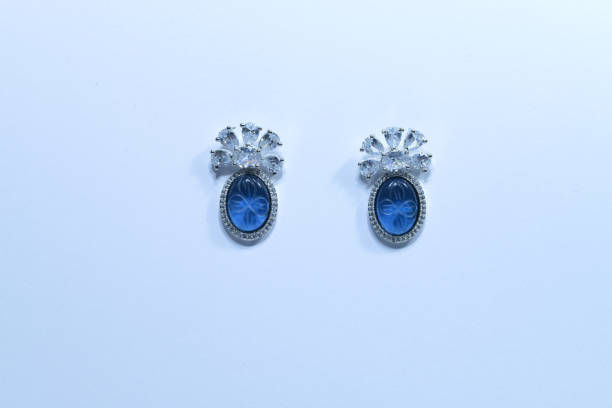 istock A pair of Blue Gemstones Earrings on white background 2205600295