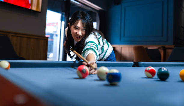 istock Having fun in a snooker bar 2205603251