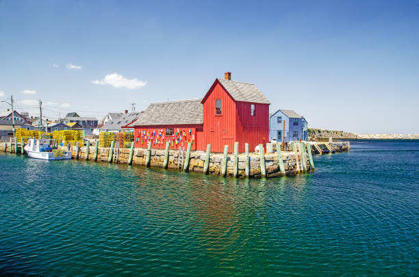istock Red Fishing Shack on ocean front 2205604088