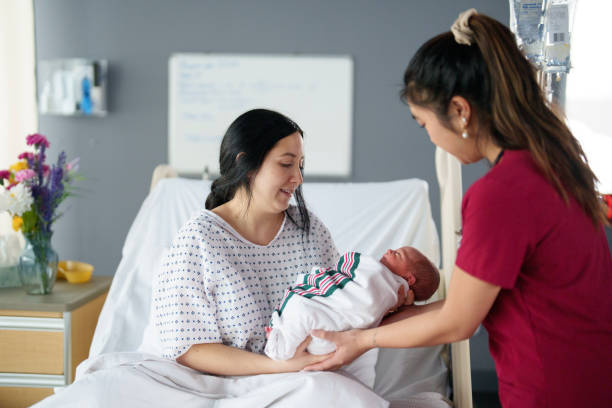 istock Women Supporting Women in Childbirth 2205605193