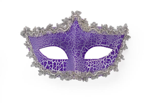 Bright purple carnival mask background, top view