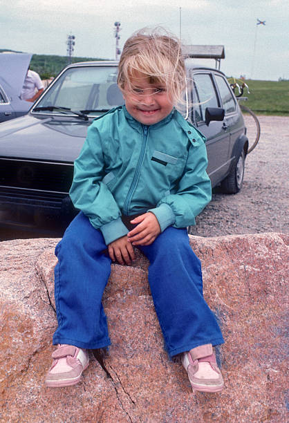 istock Cape Breton Highlands NP - Girl Posing on Rock - 1985 2205614621