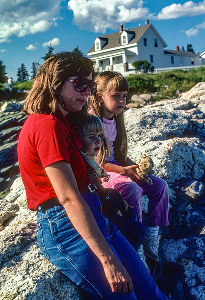 istock Pemaquid Maine - Mother & Daughters at Lighthouse - 1985 2205614817