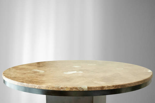 istock Round marble table top with abstract shadow drop on white wall background for mockup product display 2205615624