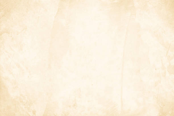 istock Colour old concrete wall texture background. Close up retro plain cream color cement wall background texture. Design paper vintage parchment element. 2205615945