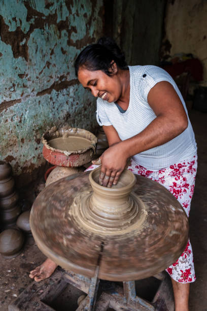 istock Lankan potter working in a workshop near Sigiriya town 2205617206